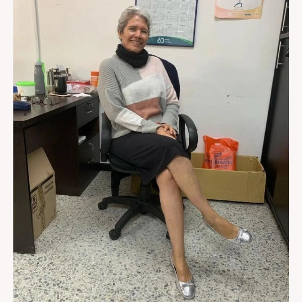 A photo of Amanda K. wearing Oh!pedics shoes: 'Super comfortable while teaching in front of the class. I can stand and walk around the campus all day without any discomfort, which is crucial for my job!'
