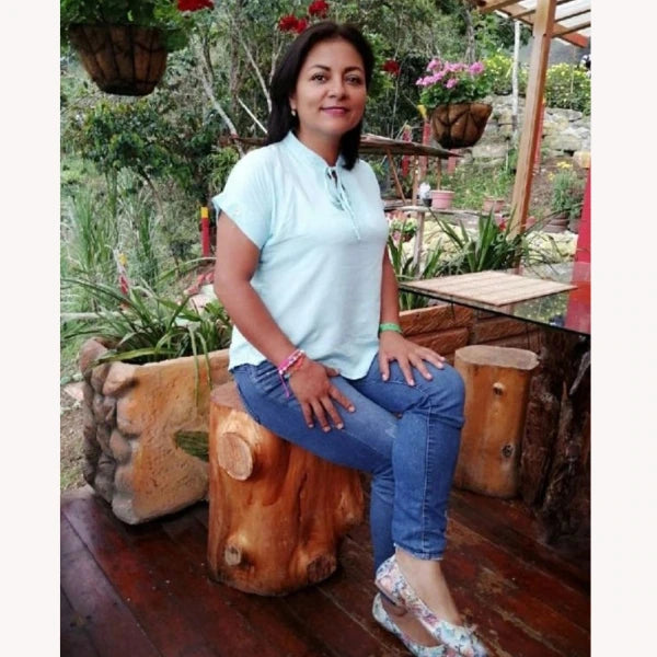 A photo of Carmen D. wearing Oh!pedics shoes: 'With other brands, I wouldn’t wear them if I were doing a lot of walking, like on a vacation or doing tours. With oh!pedics, however, I can walk comfortably all day long.'