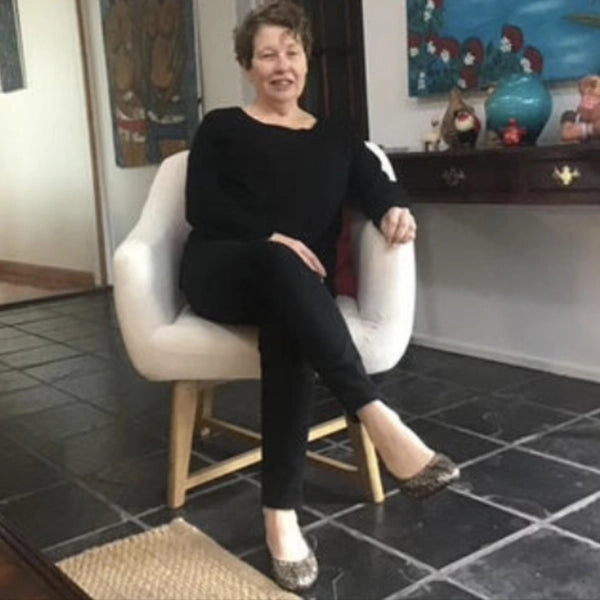 A photo of Cheryl B. wearing Oh!pedics shoes: 'I have flat feet, and the black orthotic in these ballet flats is perfect for me. They provide the support I need without sacrificing style.'