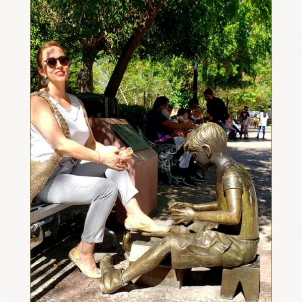 A photo of Isabella A. from Minneapolis wearing Oh!pedics shoes: 'Oh!pedics flats are the ideal solution for my foot pain. I can wear them all day without issues.'
