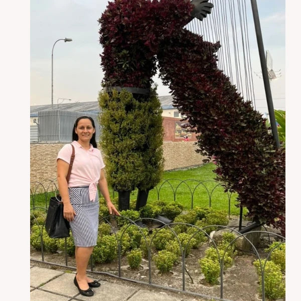 A photo of Olivia C. wearing Oh!pedics shoes: 'The thickness of the sole combined with the orthotic helps me feel safe walking on surfaces.'