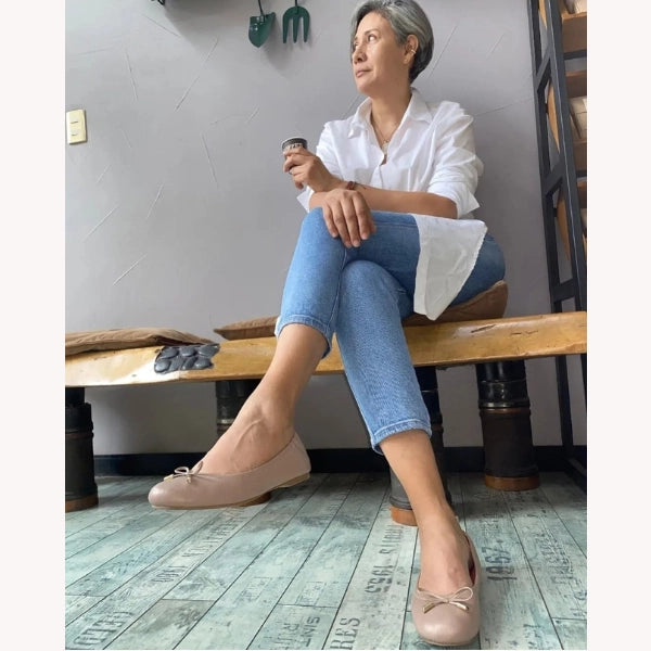 A photo of Patricia L. wearing Oh!pedics shoes: 'Oh!pedics ballet flats are a game-changer. I can wear them all day without any foot pain. The support and cushioning are incredible, and they look fantastic too! Highly recommended!'