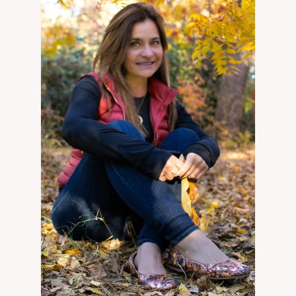 A photo of Sarah B. wearing Oh!pedics shoes: 'I bought two pairs of another brand, but they weren’t comfortable at all—not even around the house. The materials were fine, but that was about it. When my mother-in-law suggested Oh!pedics, wow what a difference. They support my feet and are incredibly comfortable!'