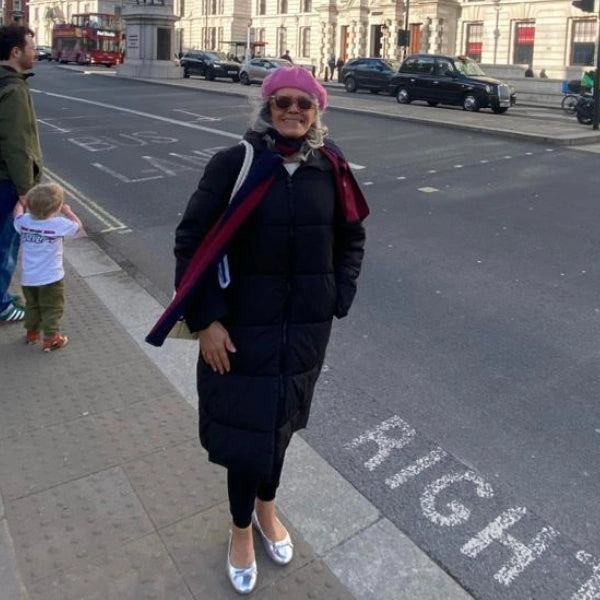 A photo of Scarlett W. wearing Oh!pedics shoes: 'As a diabetic, finding the right shoes is crucial. Ohpedics flats are soft leather and incredibly comfortable.'