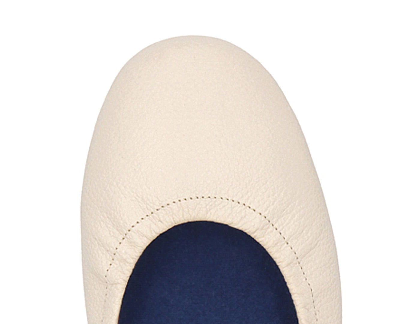 Close-up of the full grain leather on Beige Ballet Flats with removable BLUE ComfortFlex orthotic for feet without problems.