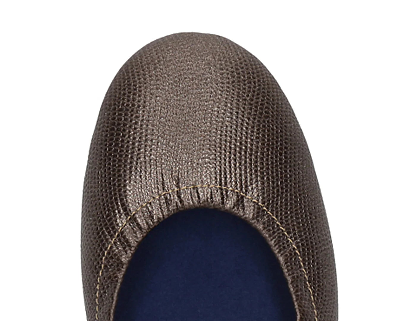 Close-up of full-grain leather on Bronze Wild Embossed Ballet Flats with removable BLUE ComfortFlex orthotic for feet without problems.