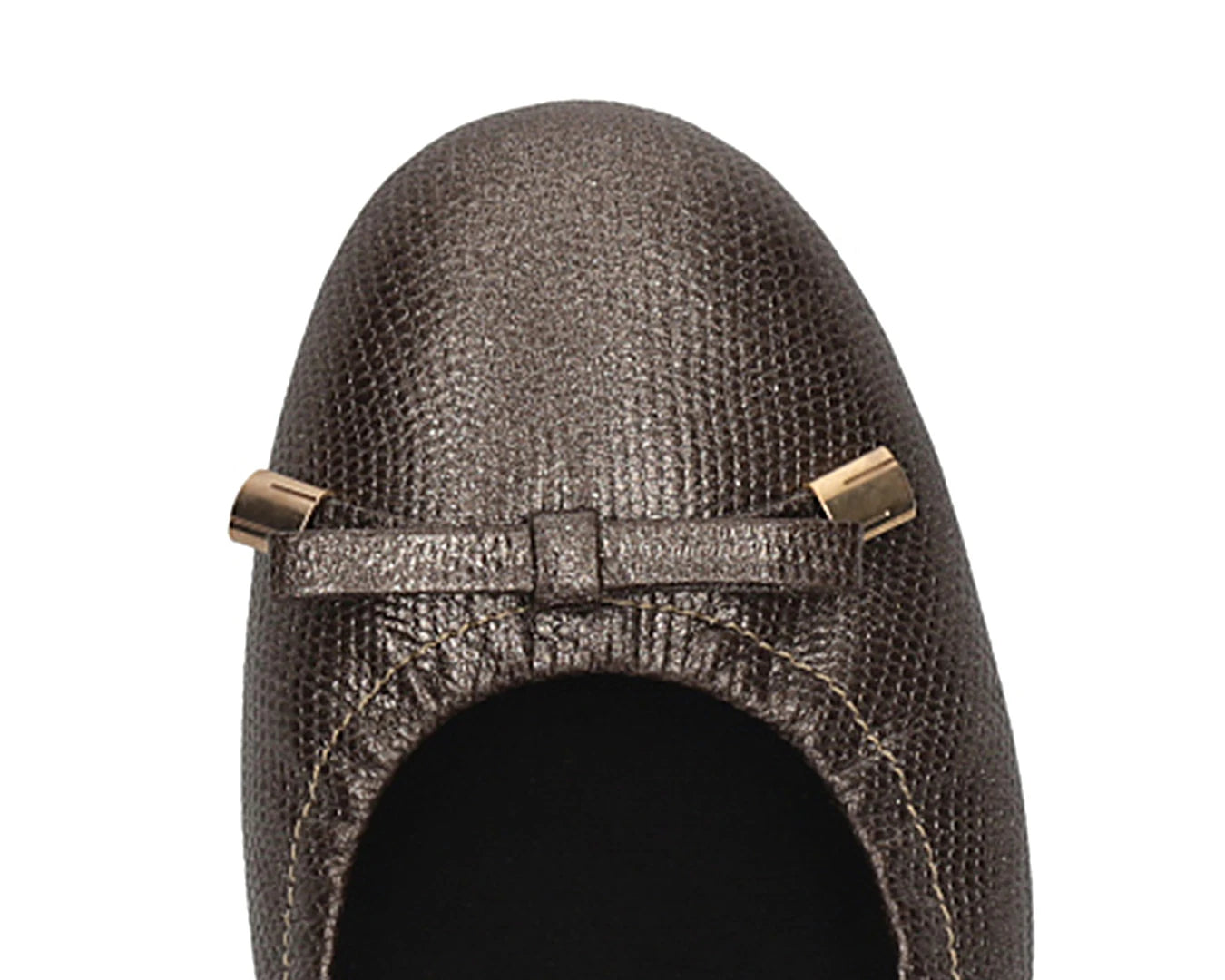 Close-up of bronze wild-embossed full-grain leather ballet flats with an elegant bow and gold tips featuring a removable BLACK FlexiComfort orthotic for flat feet.
