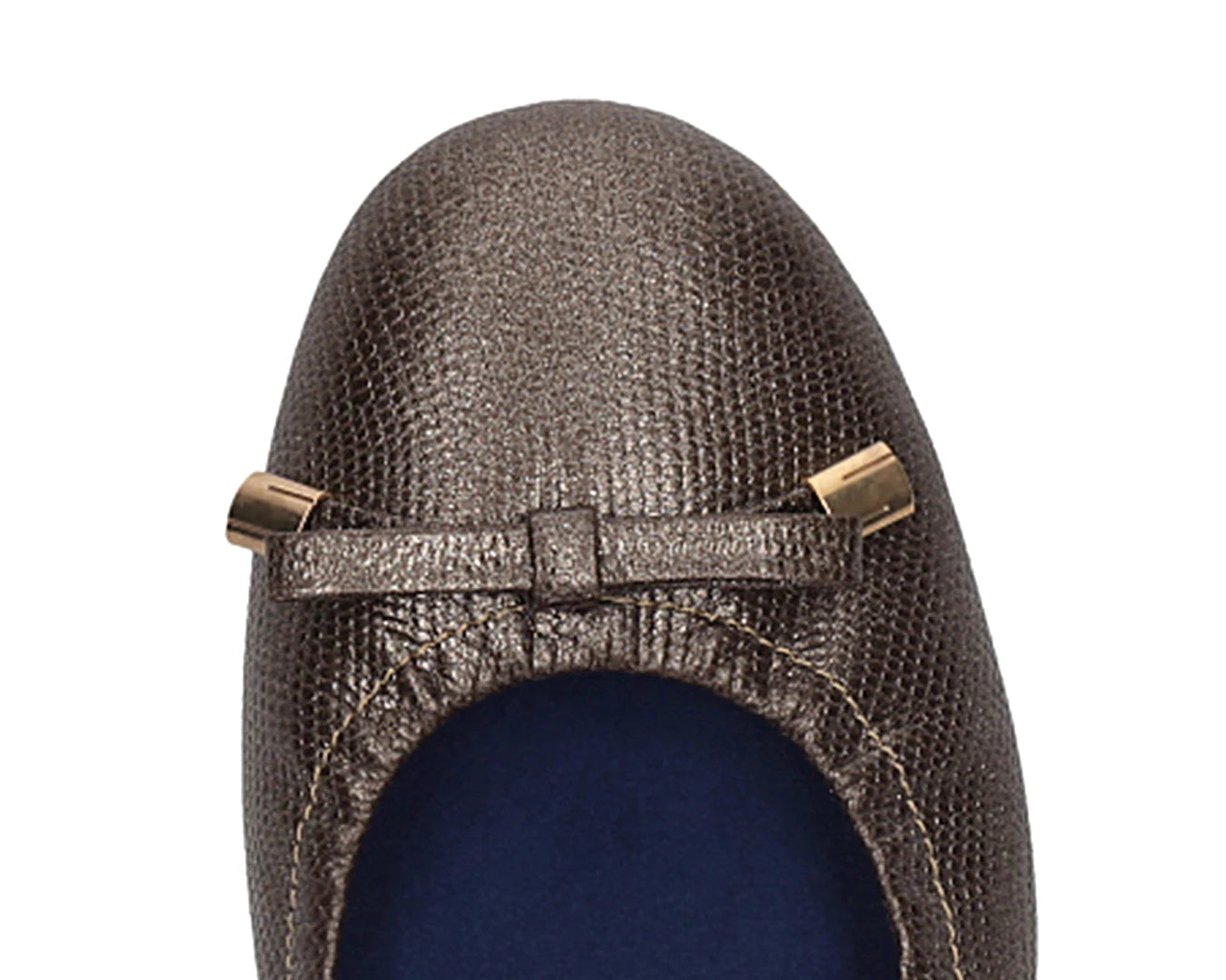 Close-up of bronze wild-embossed full-grain leather ballet flats with an elegant bow and gold tips featuring a  removable BLUE ComfortFlex orthotic for feet without problems.