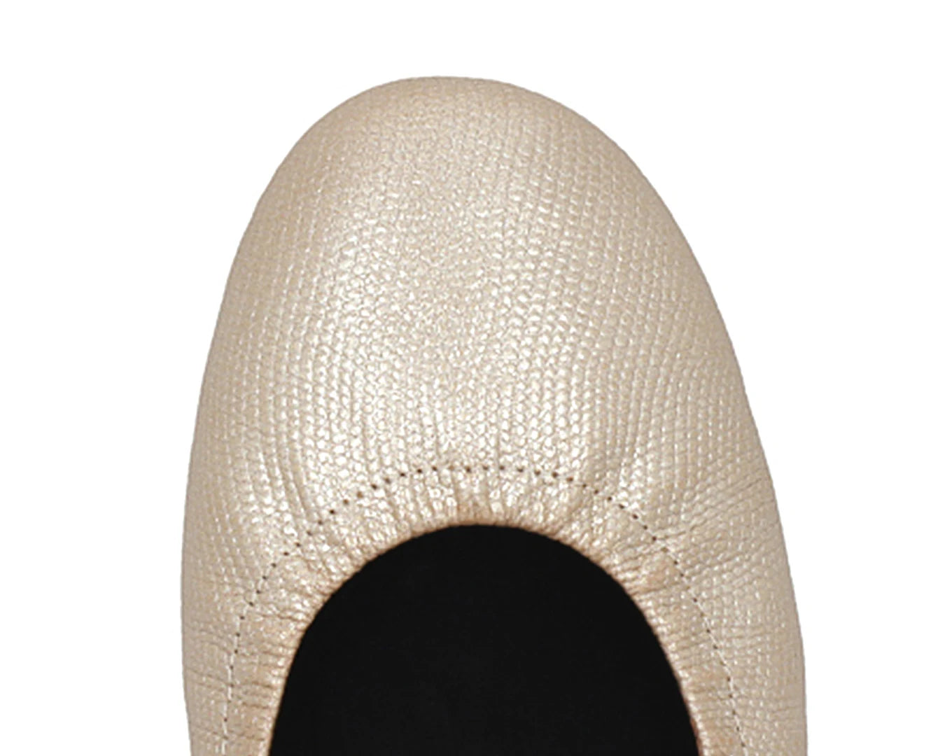Close-up of gold wild-embossed full-grain leather ballet flats featuring a removable BLACK FlexiComfort orthotic for flat feet.