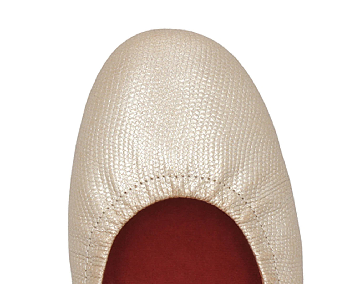 Close-up of gold wild-embossed full-grain leather ballet flats featuring a removable RED ArchSupport orthotic, designed for flat feet, calcaneal spurs, and plantar fasciitis.