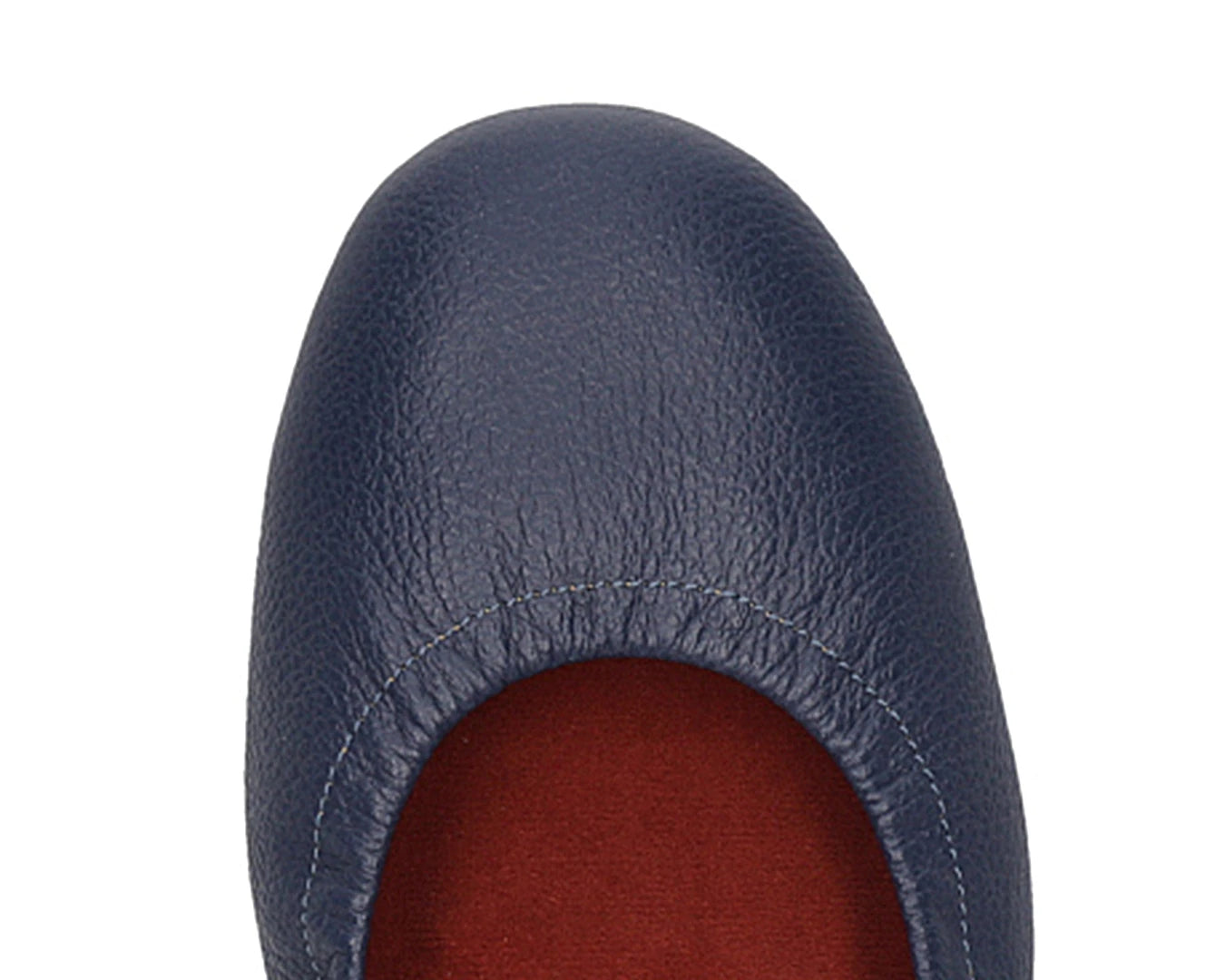 Close-up of the embossed grain leather on navy full-grain leather ballet flats with removable RED ArchSupport orthotic for flat feet, calcaneal spurs, and plantar fasciitis.