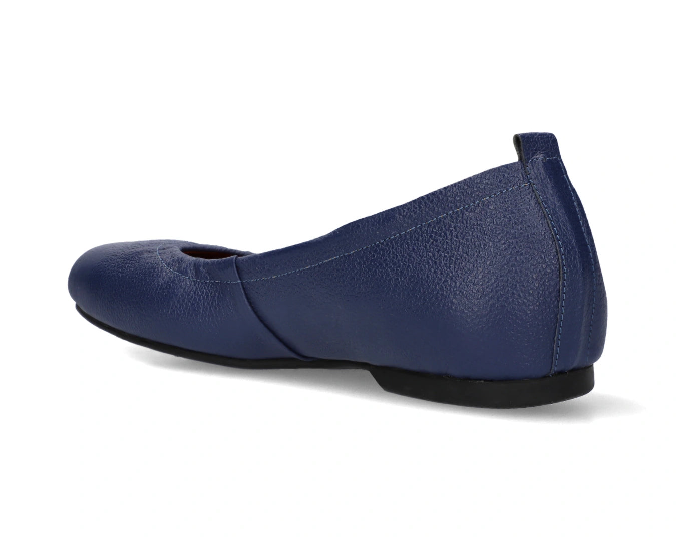 Three-quarter back view of navy full-grain leather ballet flats with a semi-round toe.