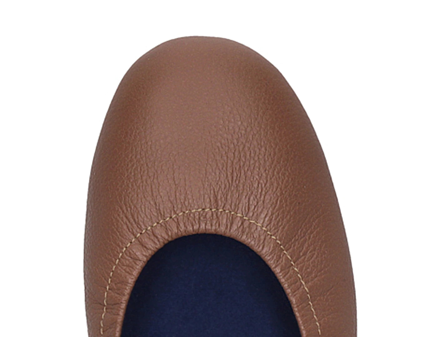 Close-up of the embossed grain leather on Nutmeg Brown Full Grain Leather Ballet Flats with removable BLUE ComfortFlex orthotic for feet without problems.