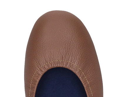 Close-up of the embossed grain leather on Nutmeg Brown Full Grain Leather Ballet Flats with removable BLUE ComfortFlex orthotic for feet without problems.