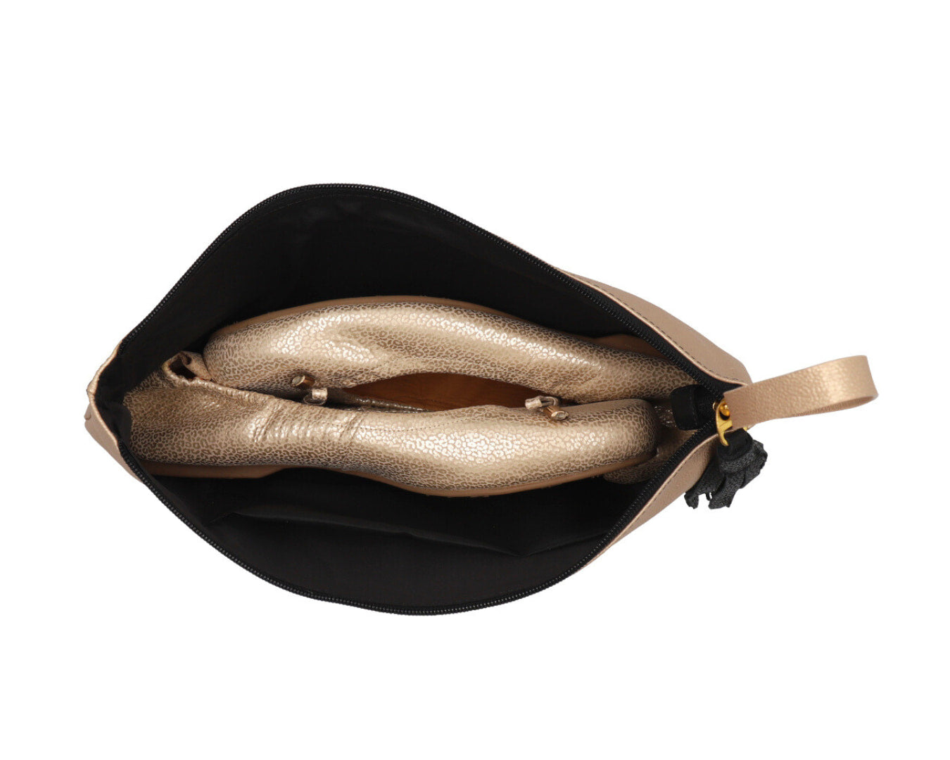 The oh! Go Full-Grain Leather Bag opened, revealing its spacious interior while holding a pair of ballet flats—designed for stylish versatility and everyday convenience.