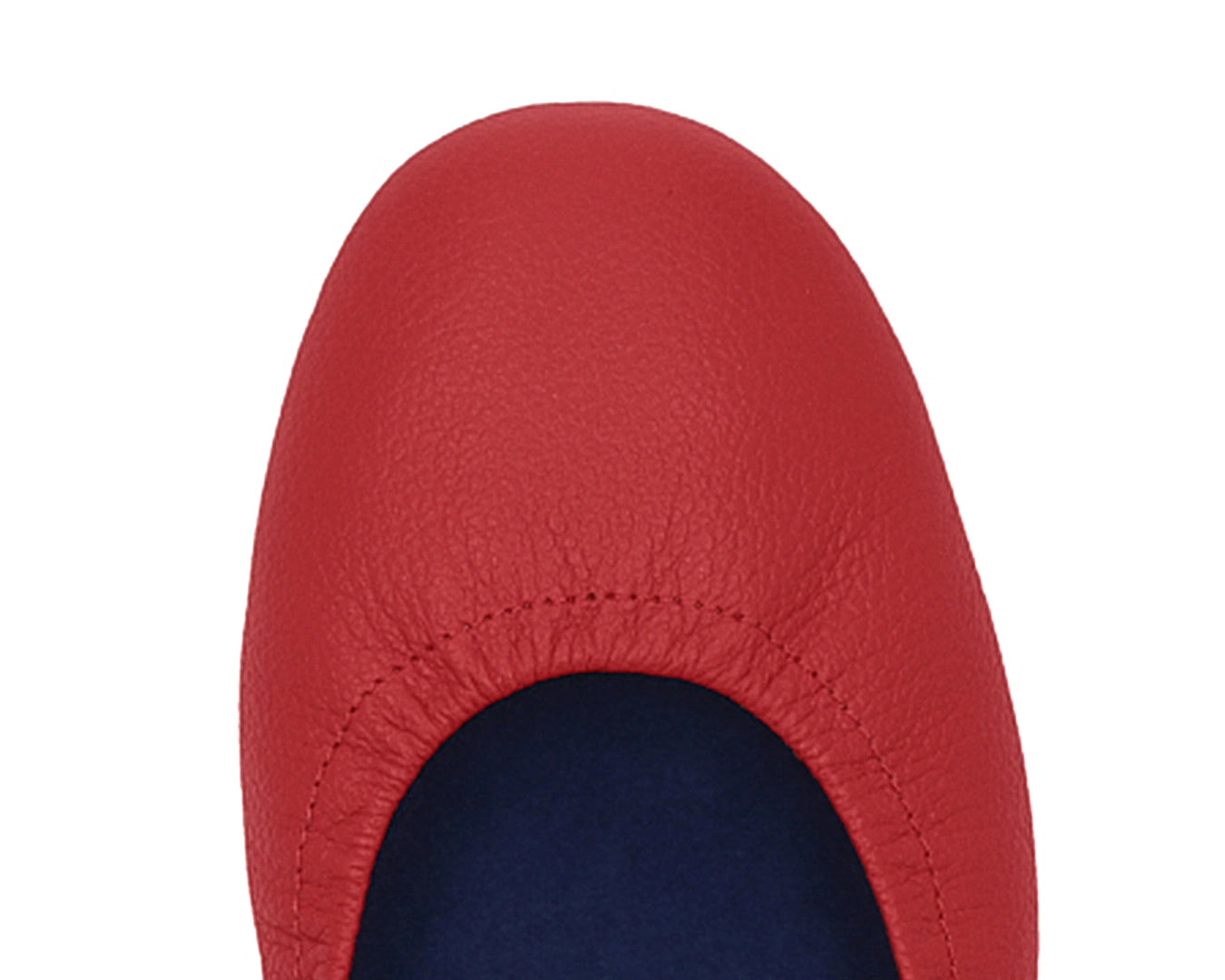 Close-up of full-grain leather on Red Ballet Flats with removable BLUE ComfortFlex orthotic for feet without problems.