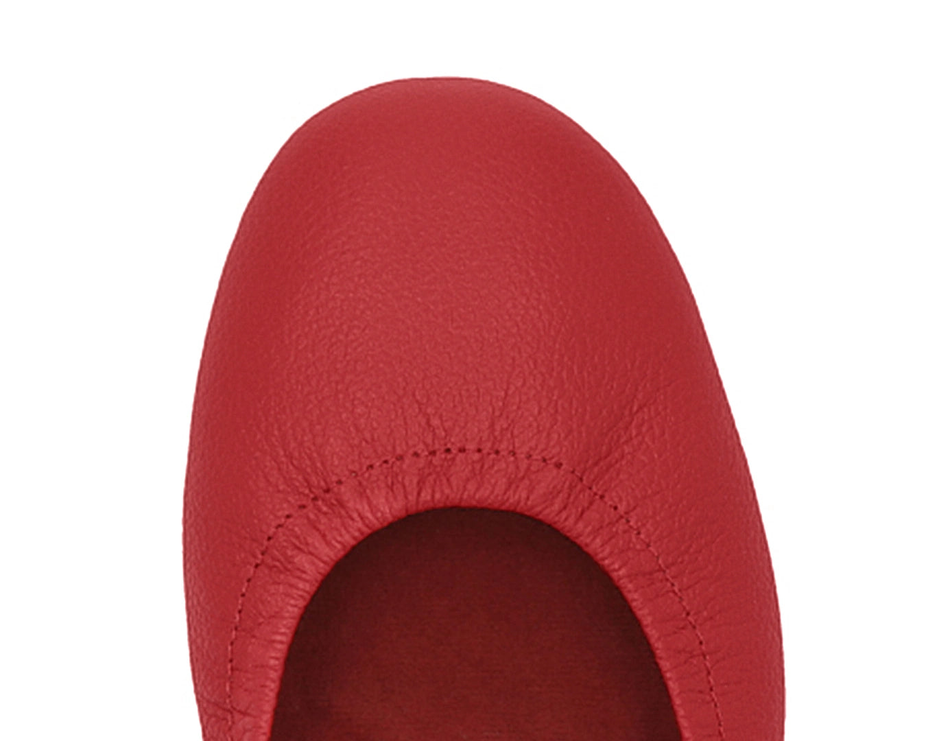 Close-up of the full-grain leather on Red Ballet Flats with removable RED ArchSupport orthotic for flat feet, calcaneal spurs, and plantar fasciitis.