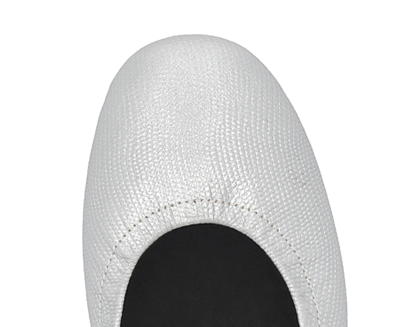 Close-up of silver wild-embossed full-grain leather ballet flats featuring a removable BLACK FlexiComfort orthotic for flat feet.