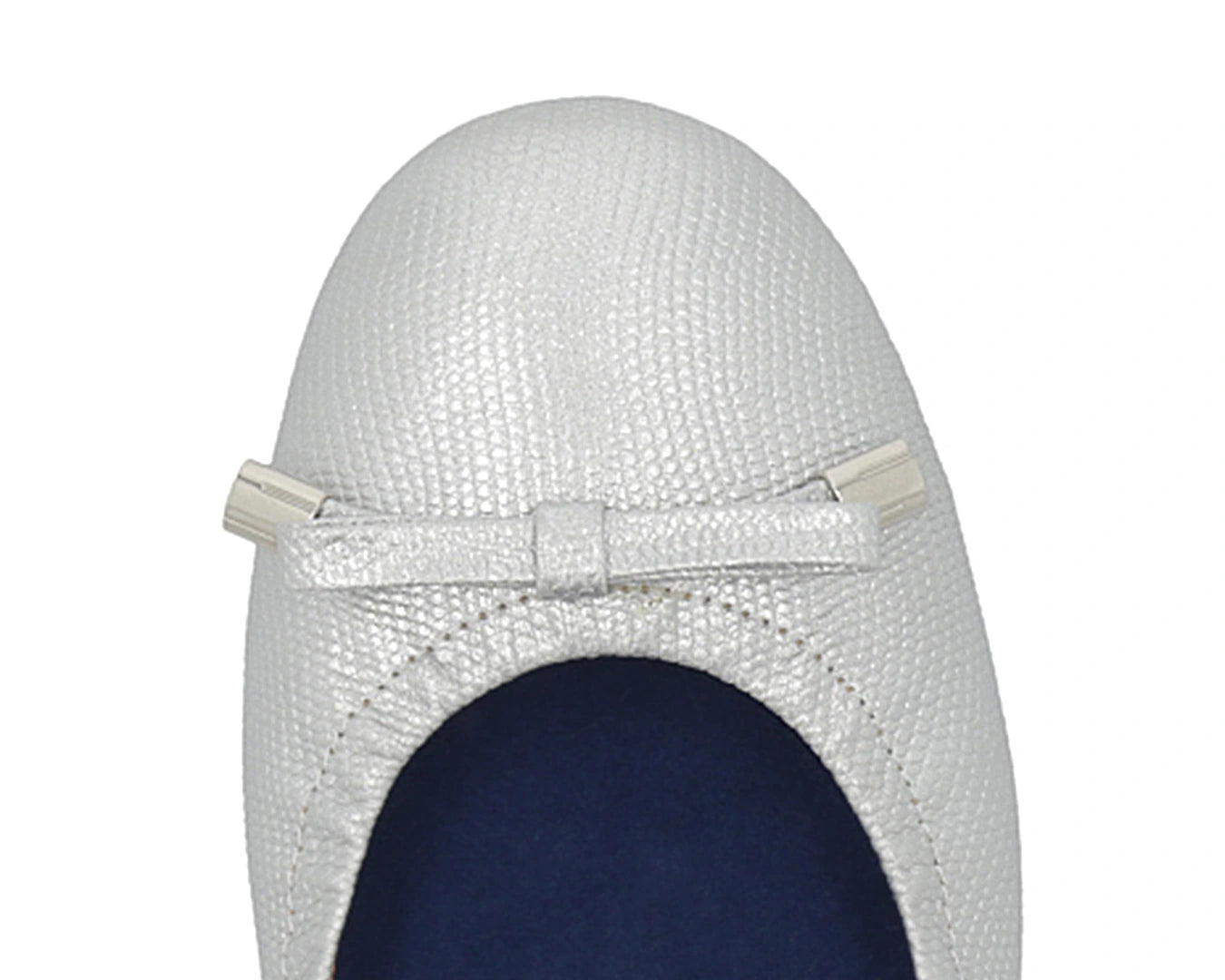 Close-up of silver wild-embossed full-grain leather ballet flats with an elegant bow and silver tips featuring a  removable BLUE ComfortFlex orthotic for feet without problems.