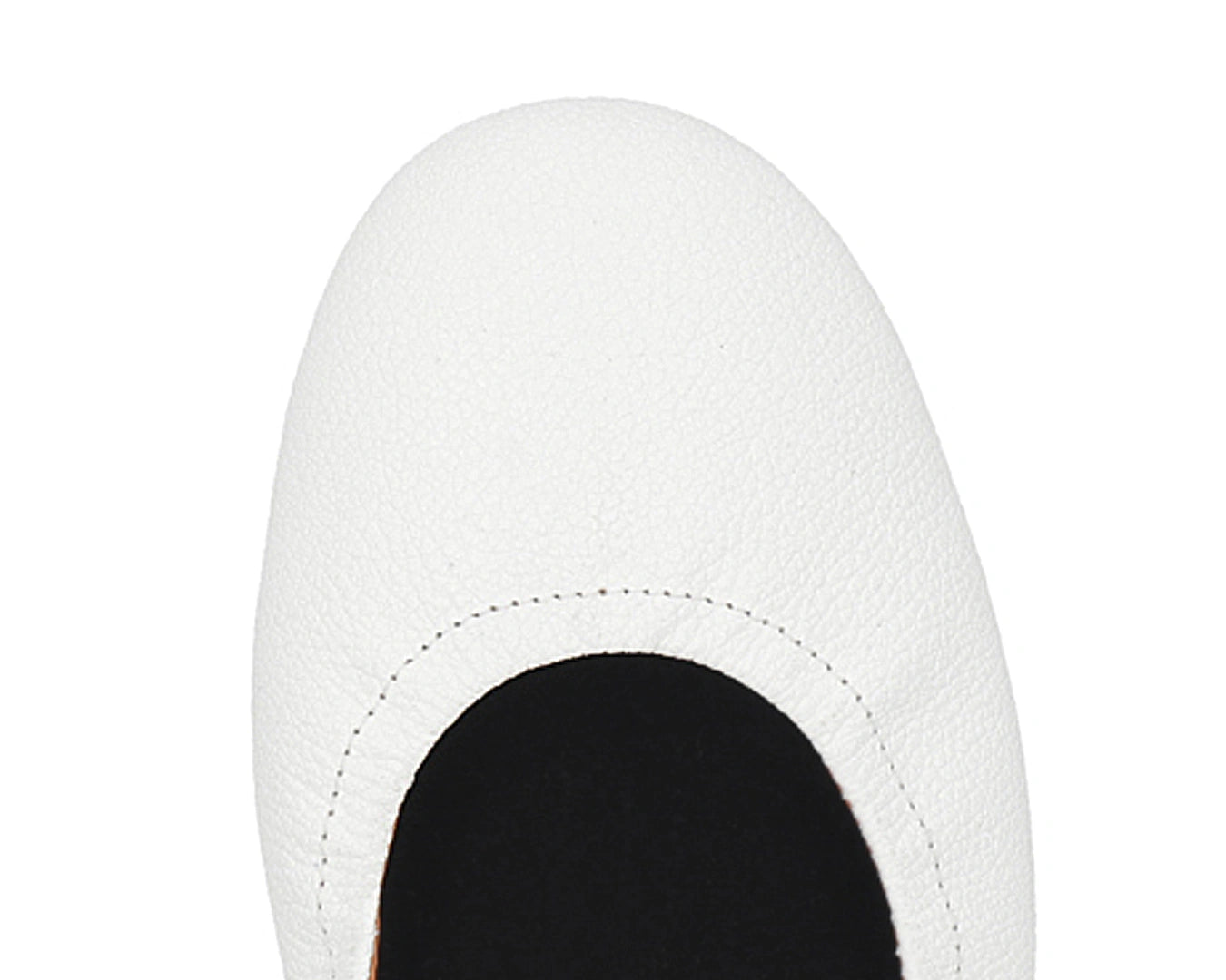 Close-up of the full-grain leather on White Ballet Flats with removable BLACK FlexiComfort orthotic for flat feet.