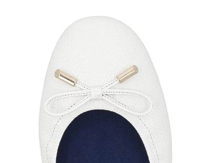 Close-up of the embossed grain leather on White full-grain leather ballet flats with removable BLUE ComfortFlex orthotic for feet without problems and 24k-gold-plated-bows.