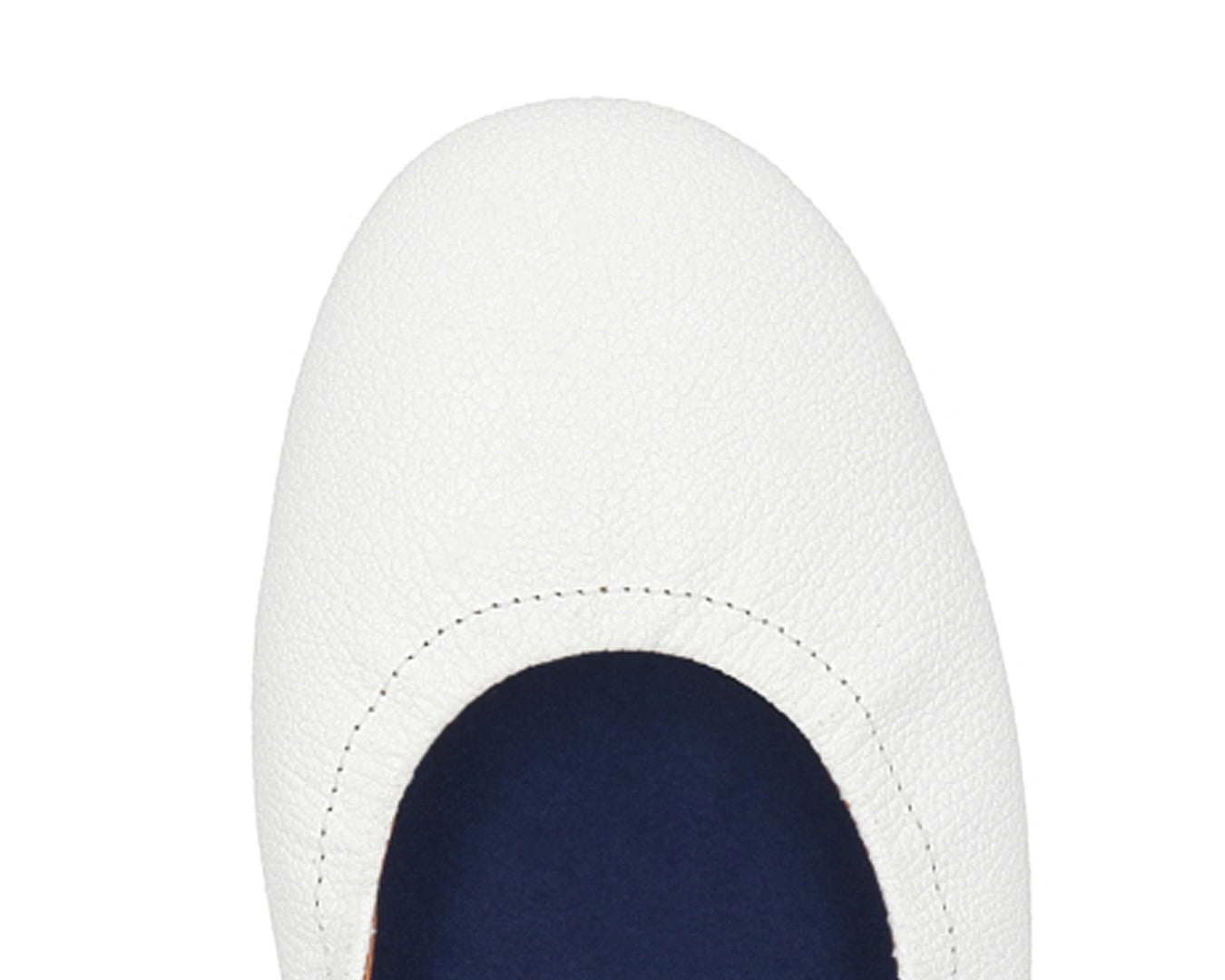 Close-up of full-grain leather on White Ballet Flats with removable BLUE ComfortFlex orthotic for feet without problems.
