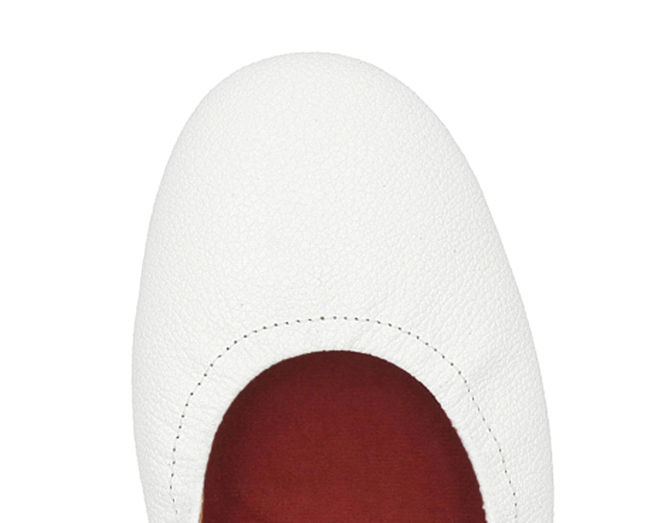 Close-up of the full-grain leather on White Ballet Flats with removable RED ArchSupport orthotic for flat feet, calcaneal spurs, and plantar fasciitis.