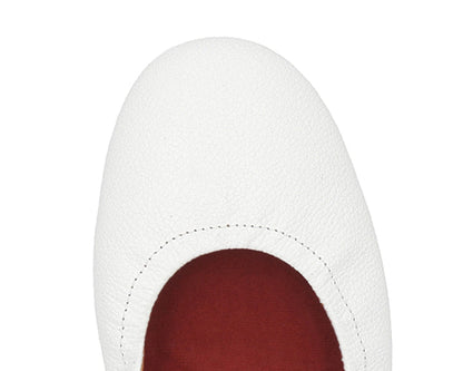 Close-up of the full-grain leather on White Ballet Flats with removable RED ArchSupport orthotic for flat feet, calcaneal spurs, and plantar fasciitis.